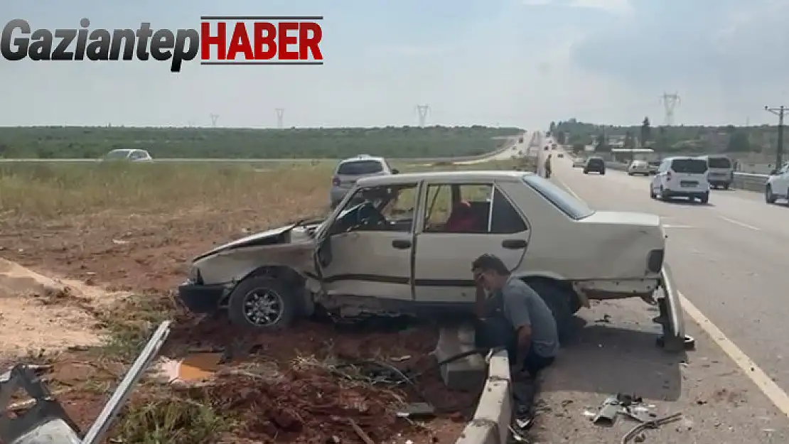 Kaza yaptığı aracının başında gözyaşı döktü