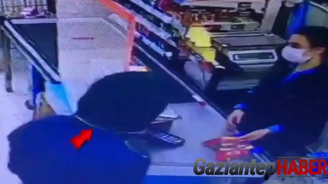 Müşteri gibi gelip silah çekerek marketi soydu