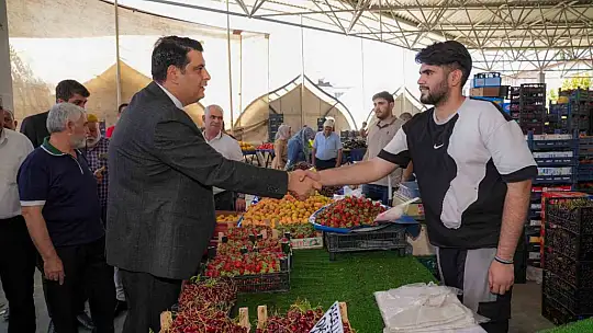 Yılmaz, pazarcı esnafıyla bir araya geldi
