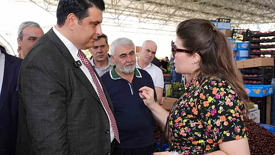 Yılmaz, pazarcı esnafıyla bir araya geldi