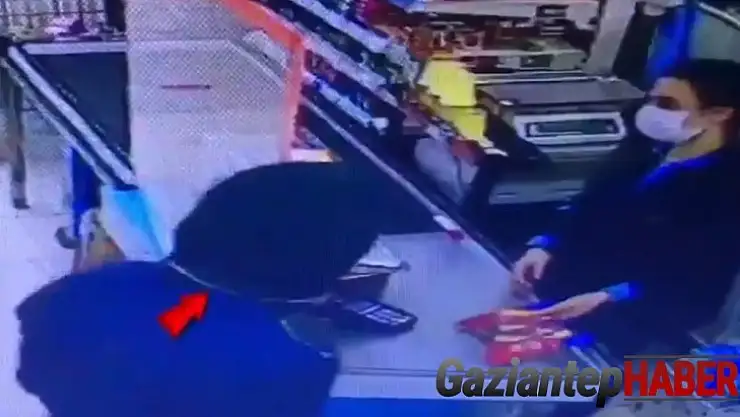 Müşteri gibi gelip silah çekerek marketi soydu